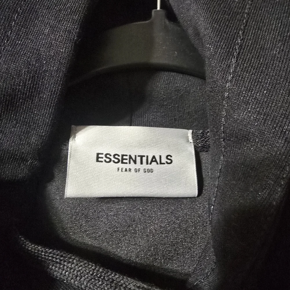 Essentials Black Hoodie - NWOT - Picture 3 of 3